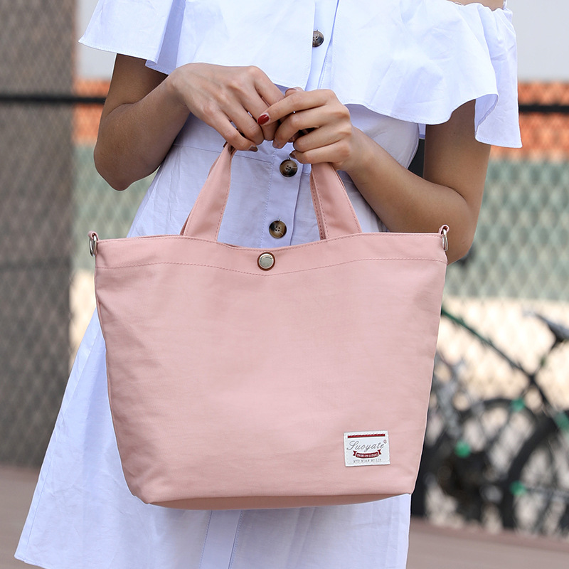 女士手提牛津布包新款尼龙女包斜跨包单肩包帆布包大容量单色包女