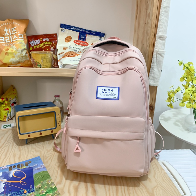 2023 New Middle School Student Schoolbag Female Junior High School Student Burden Alleviation Backpack High School Student College Style Pure Color All-Matching Backpack