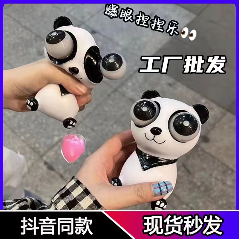 new exotic eye-popping panda glaring hand pinch decompression vent decompression pinch music toy creative doll cute toy