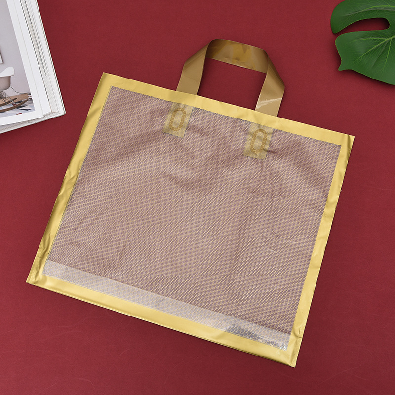 现货批发美妆手提袋网格透明塑料手提包装袋方底可降解新款袋子