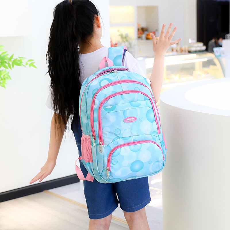 跨境批发小学生背包女孩轻便双肩包三四年级儿童6-14岁大容量书包