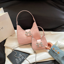 甜美粉色蝴蝶结手提包包女士2024新款潮时尚小众腋下包链条斜挎包