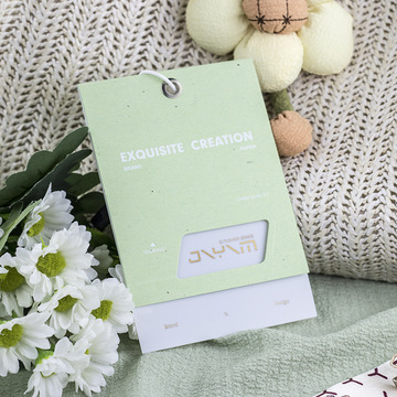 浅绿色特种纸镂空烫亚金吊牌定 制时尚美观原创logo挂牌订 做