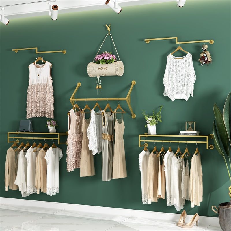 男女童服装店展示架上墙壁挂式店铺陈列货架金色挂衣服的架子墙上