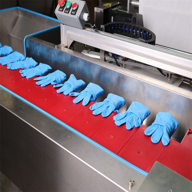 pvc检查一次性食品烘焙乳胶手套包装机橡胶美容染发薄膜套入袋机