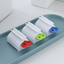 挤牙膏神器 创意简约座式牙膏夹洗面奶按压器 儿童手动挤牙膏器