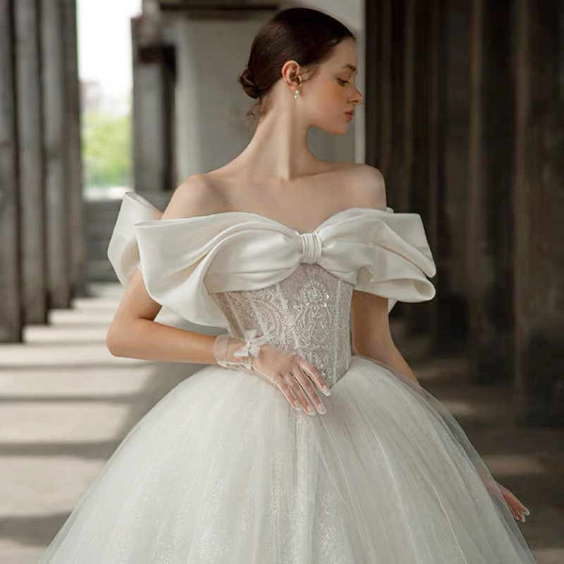 一字肩婚纱礼服2021秋新品在逃公主气质网纱蝴蝶结婚纱一字肩婚纱