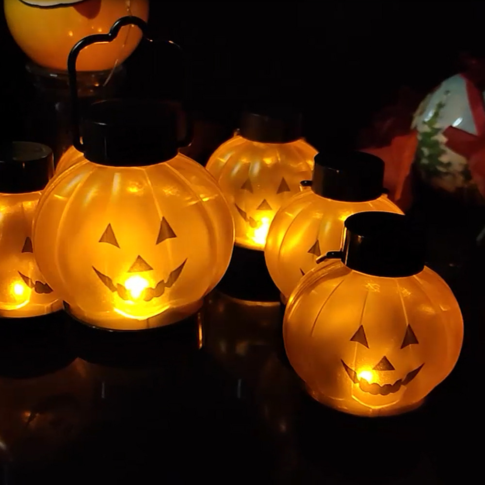 跨境亚马逊新品万圣节发光小灯笼 创意节日装饰挂灯鬼脸led电子灯