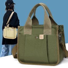 新款日系手提帆布包纯色外贸单肩斜跨女包工作饭盒袋大容量时尚包