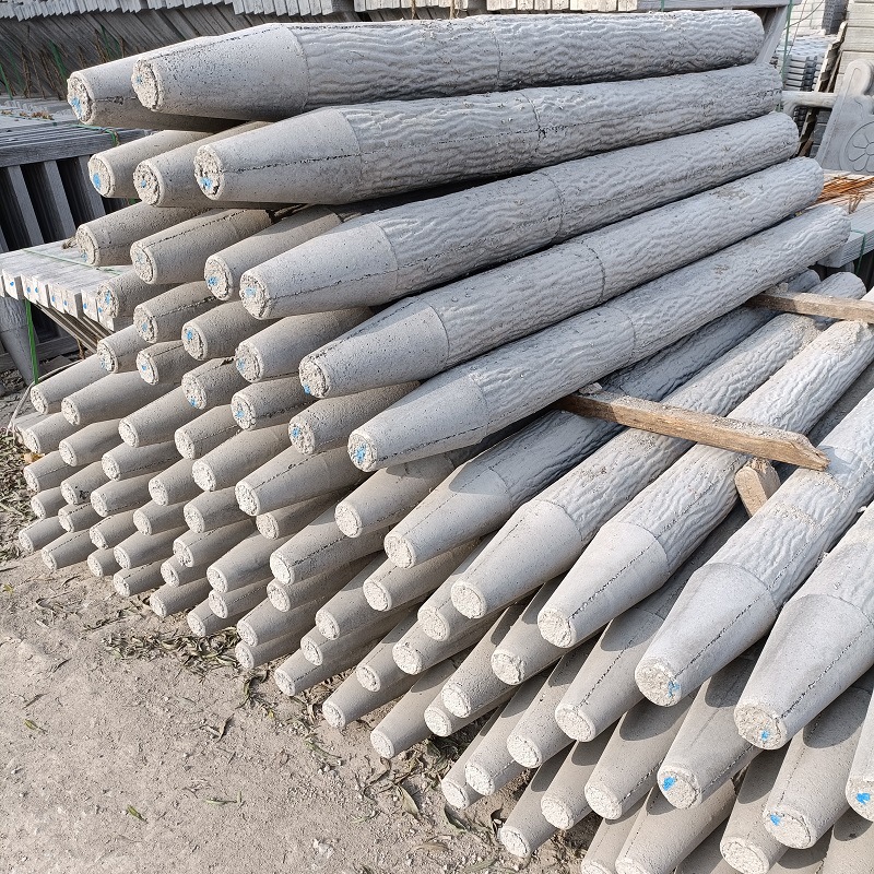 唐盛水泥仿木桩护栏 仿树桩河道景观护栏  水泥围挡 树桩石