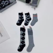 儿童袜子2021新款棉袜长筒中通学院菱形格方块格条纹织带童装袜子