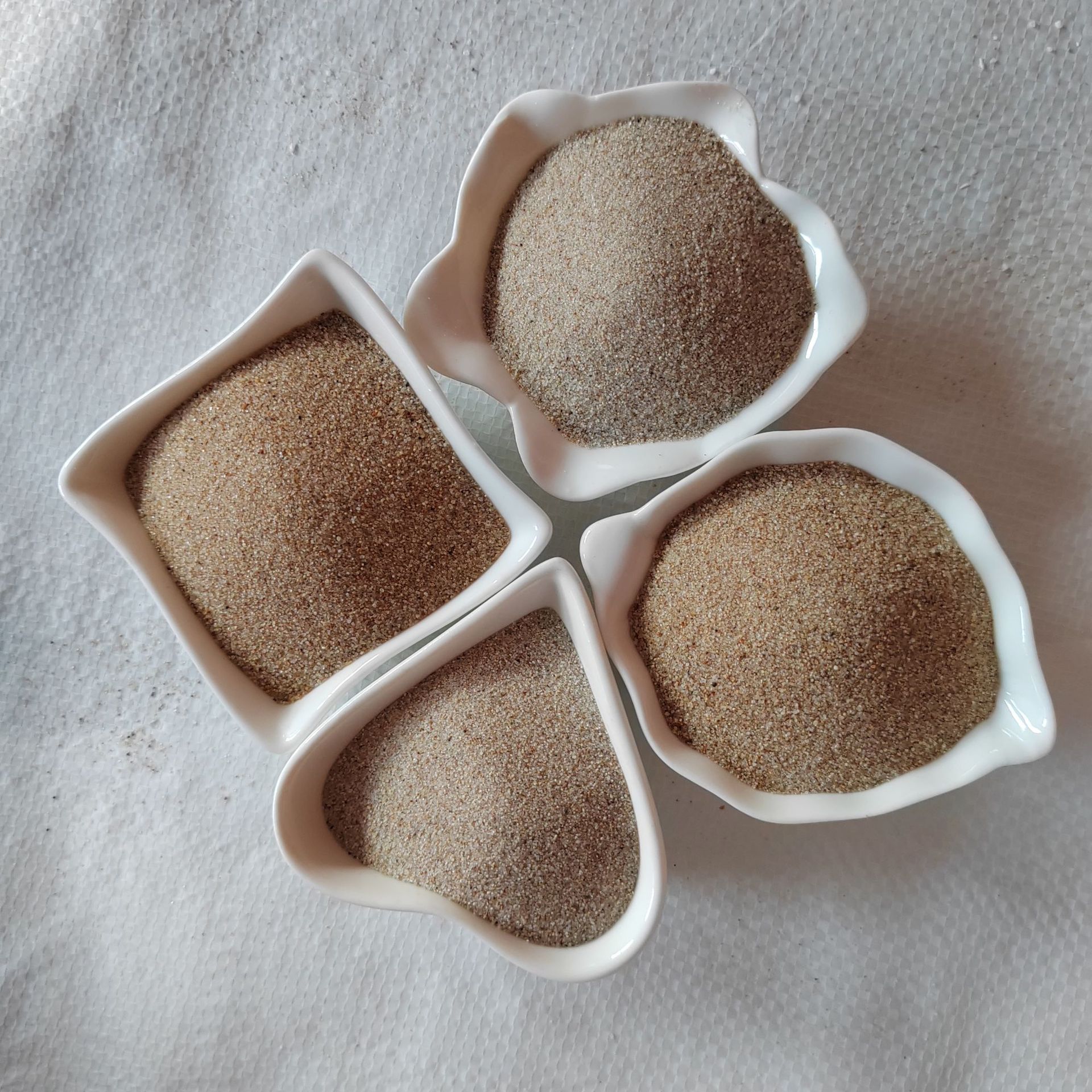 天然圆粒海沙水族沙漏儿童游乐场人造沙滩沙池专用海砂厂家直供