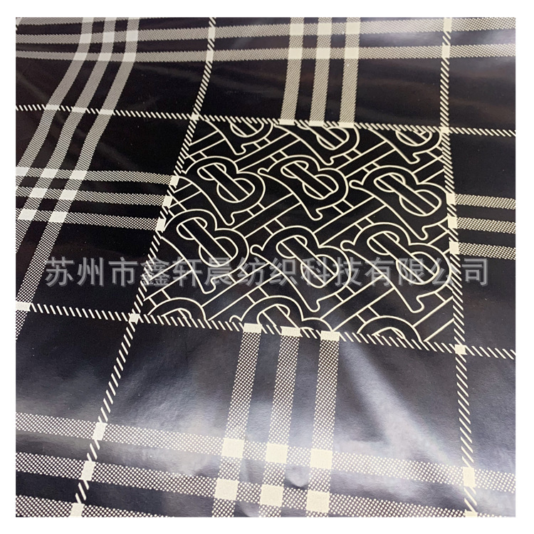 新款春亚纺离型纸转移膜亮面反光字母pu膜格子印花羽绒服棉衣面料