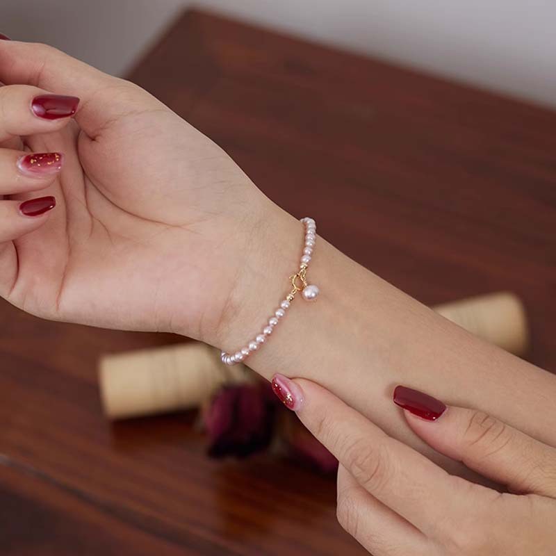 s925银粉紫色正圆强光天然淡水珍珠手链手串手饰诸暨珠宝首饰批发