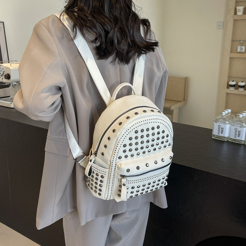 2024 New Fashion Rivets Soft Leather Solid Color Backpack Casual Women's Backpack