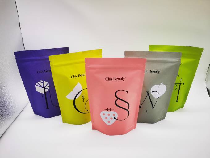 牛皮纸单色印刷烫黑金袋子茶叶包装袋自立袋带拉链免版费印刷