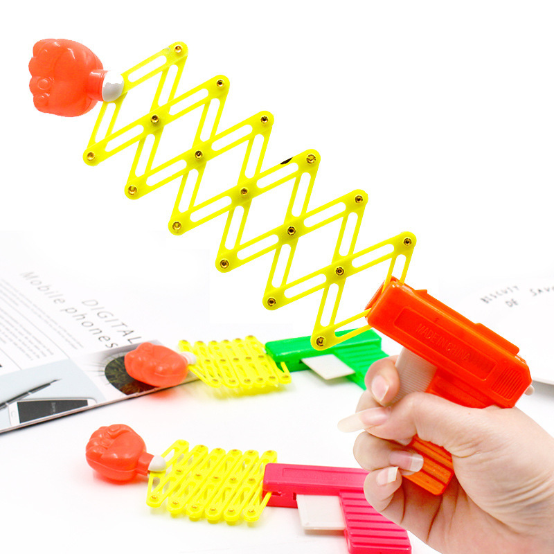 新款整蛊搞怪玩具儿童弹力伸缩拳头枪80后童年怀旧经典儿童玩具