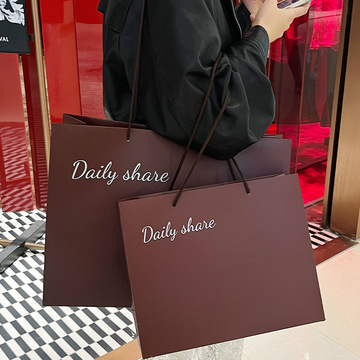 服装店手提袋女装衣服专用肩背购物纸袋纸包装袋子新年印刷-阿里巴巴