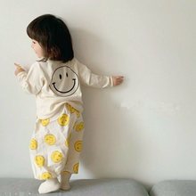春秋男女宝宝笑脸长袖棉T恤长裤两件套婴儿宽松休闲套装中小童