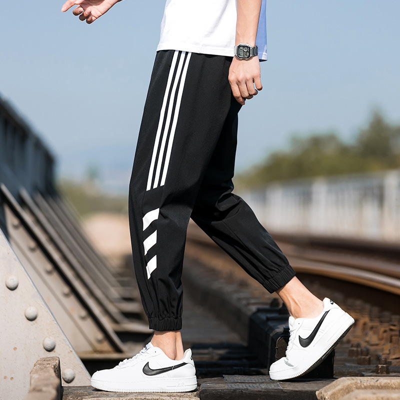 Casual Pants Men's Summer Thin Fashion Brand Breathable Air Conditioning Pants Men's Loose Tappered Cropped Sports Ice Silk Leggings Men's