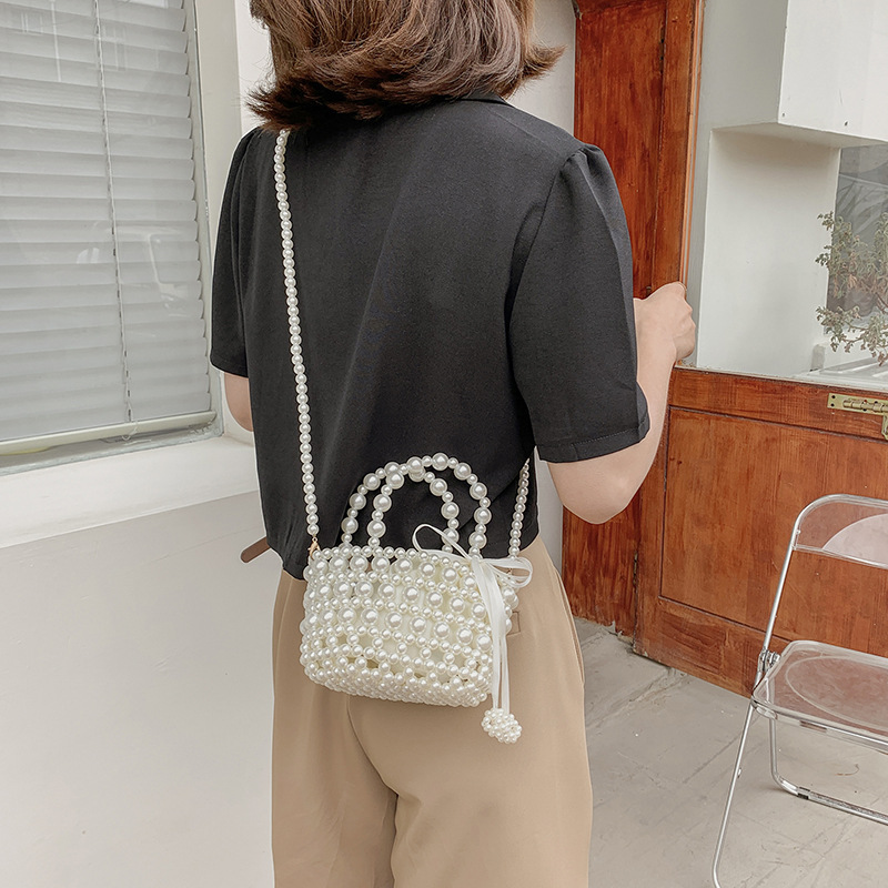 Summer Internet Celebrity Women's Bag New Simple Pearl Tote Texture Western Style Hollow Woven Bag Women's Bag