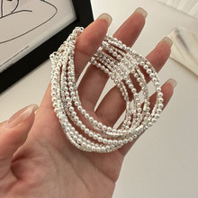 S925纯银韩版碎银子珍珠缠绕手链时髦基础款东大门原单设计手饰品