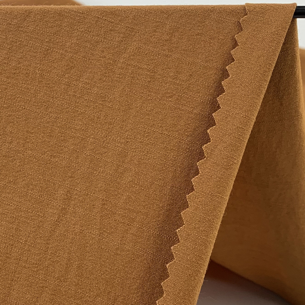 nr弹力冰麻竹节时装面料 粘胶纤维锦纶混纺素色复古衬衫布料 现货