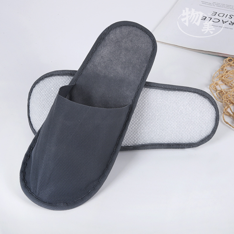 Wholesale Hotel Disposable Slippers Hanting Disposable Non-Woven Fabric Slippers Travel Portable B & B Slippers Manufacturer