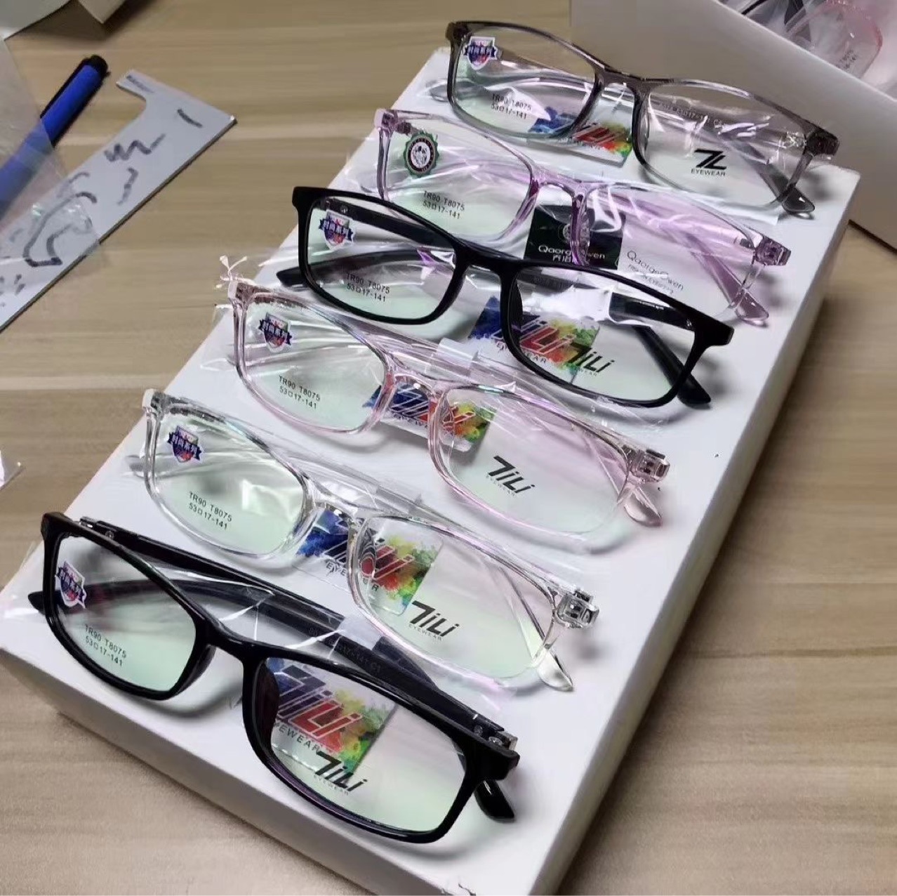 新款木九十蔡司莱肯精工暴龙透明板材tr近视眼镜框眼镜架