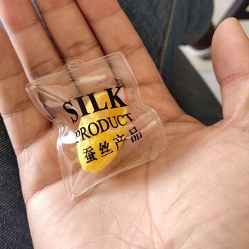 吊牌批发金黄色开口洗脸蚕丝球 桑蚕削口茧 吊粒-阿里巴巴