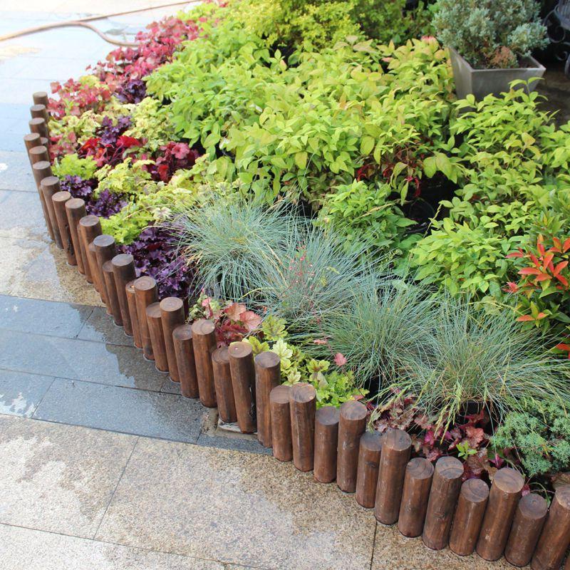 木桩花园围栏户外碳化防腐木栅栏幼儿园篱笆木栅栏阳台圆木桩代发