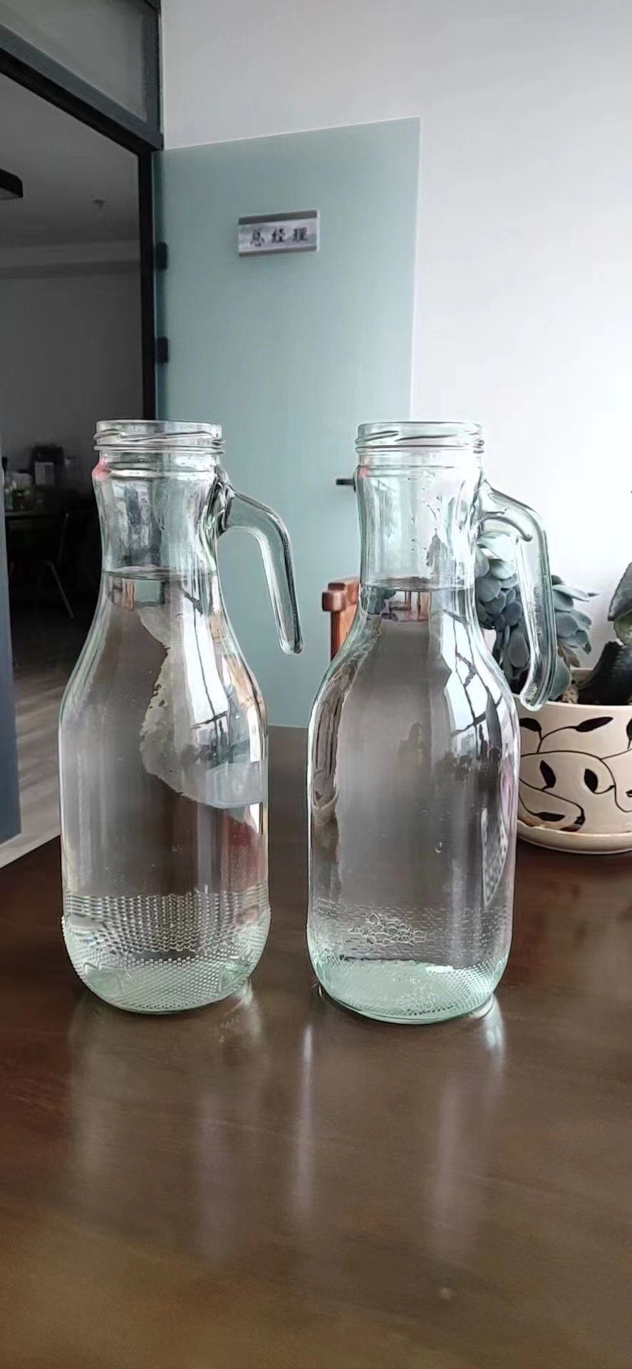 厂家直销1升1.5l把手饮料玻璃瓶芒果汁蓝莓汁石榴酒玻璃容器带盖