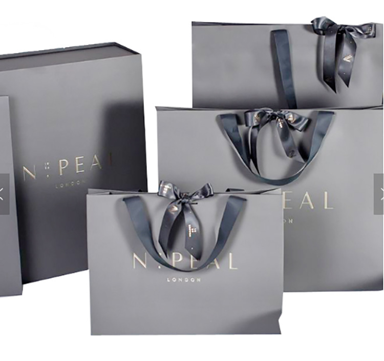 尼龙绳手提袋牛皮纸袋服装大袋子纸质印logo大号衣服购物包装