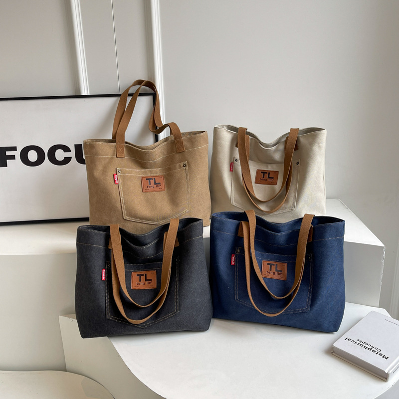 时尚帆布包女新款大容量通勤牛仔布托特包百搭学生跨境单肩大包包
