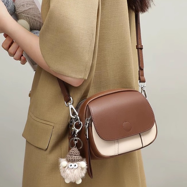 高级感洋气包包女2024新款小众设计斜挎包迷你小圆包手提单肩女包