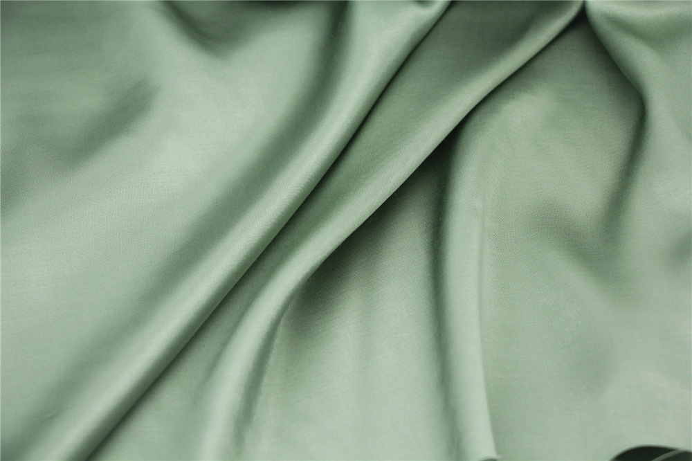 抗皱垂顺光泽感 豆绿色缎面化纤麻纱缎布料 连衣裙阔腿裤礼服