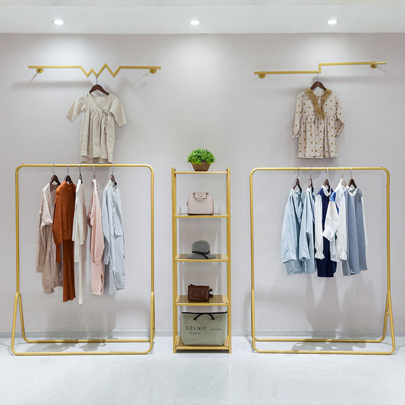 女装店货架展示架落地式上墙壁挂式金色服装店装修效果图设计装饰