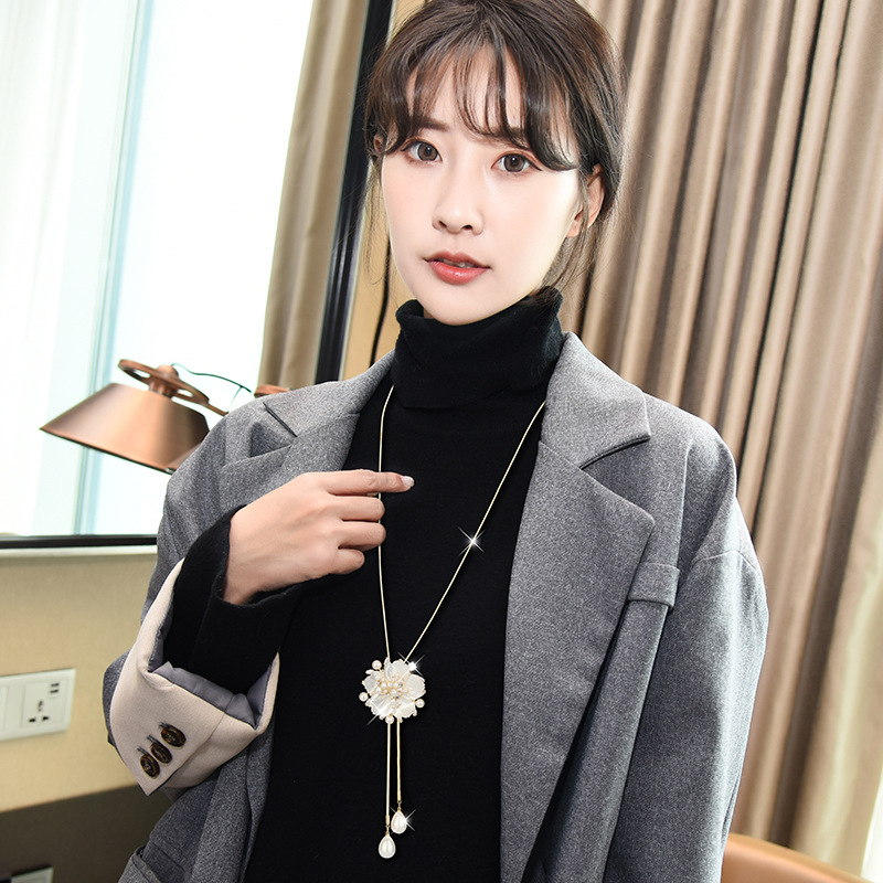 2021秋冬新款贝壳花朵毛衣链女时尚简约大气珍珠流苏项链跨境批发