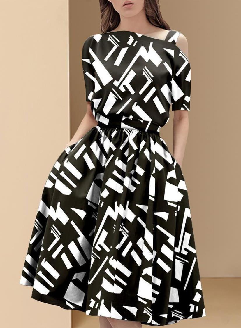 黑白花色修身连衣裙图片