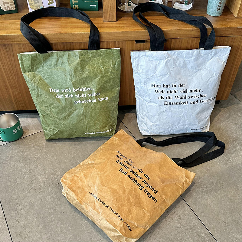 手提包女新款时尚杜邦纸休闲单肩手提包百搭字母杜邦纸包包大容量