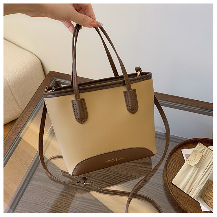 时尚撞色手提包包女2024新款潮法国小众跨境爆款单肩斜挎水桶包潮