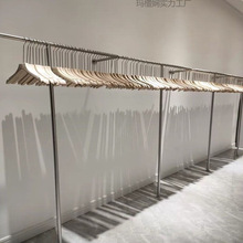 爆款服装店展示架上墙落地不锈钢银拉丝墙上童装女装店货架墙壁挂