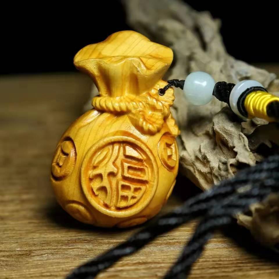 崖柏木雕刻挂件吸财钱袋挂件手把件保平安招财护身木雕旺财工艺品