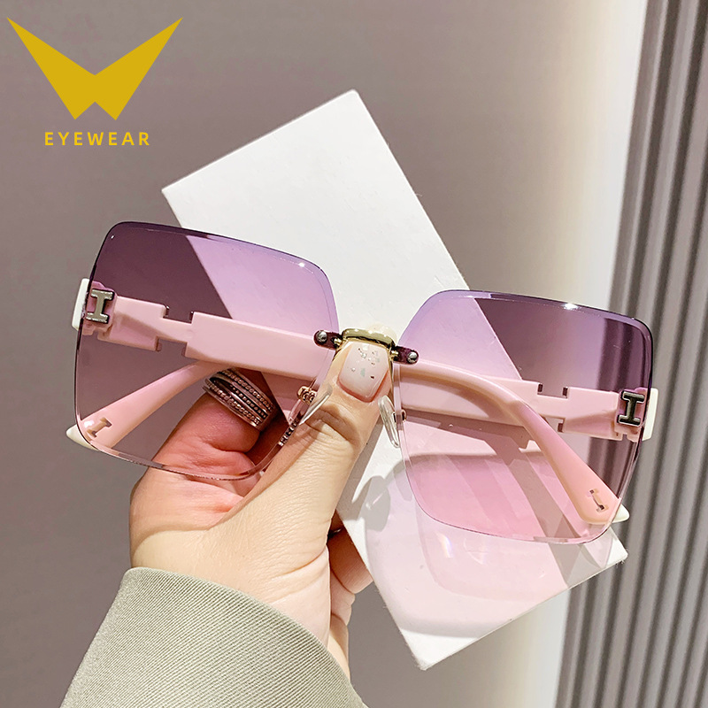 2023 New Frameless Two-Color Gradient High Sense Women's Fashion Driving Sunglasses Fashion Sunglasses Wholesale Factory