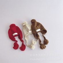 韩国风儿童针织护耳帽子 秋冬大毛球男童女童布标手工纯色毛线帽