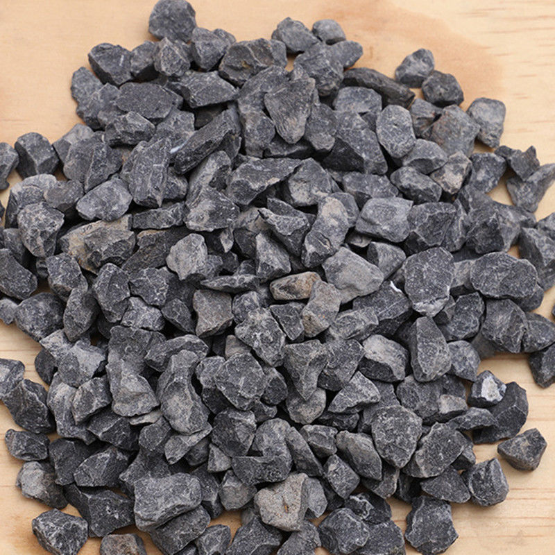 石子黑色砾石黑色机制垫路小石子灰色铺路水磨瓜子片石头碳酸钙石