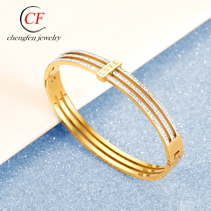 新款女式love横杠镀金手镯不锈钢手饰欧美流行三排白泥锆石手环