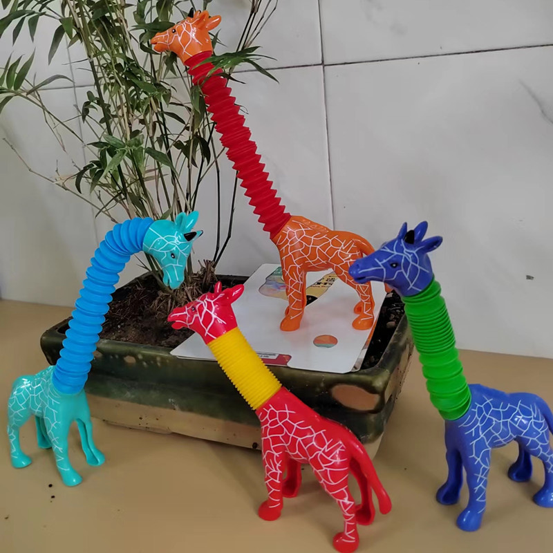 跨境新奇玩具减压伸缩管恐龙DIY可伸缩长颈鹿减压创意玩具批发