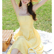 新款法式露背性感黄色吊带连衣裙夏季新款吊带裙收腰长裙度假裙子