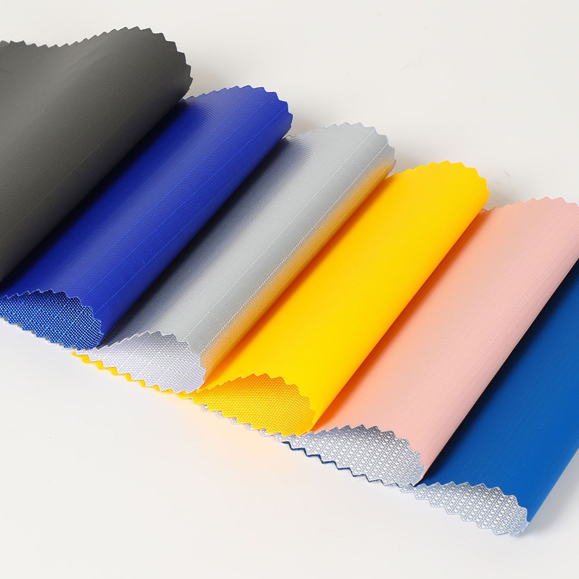 420d皮膜胶涤纶布背包手袋提花离型纸涤纶箱包面料各种pu防水布料